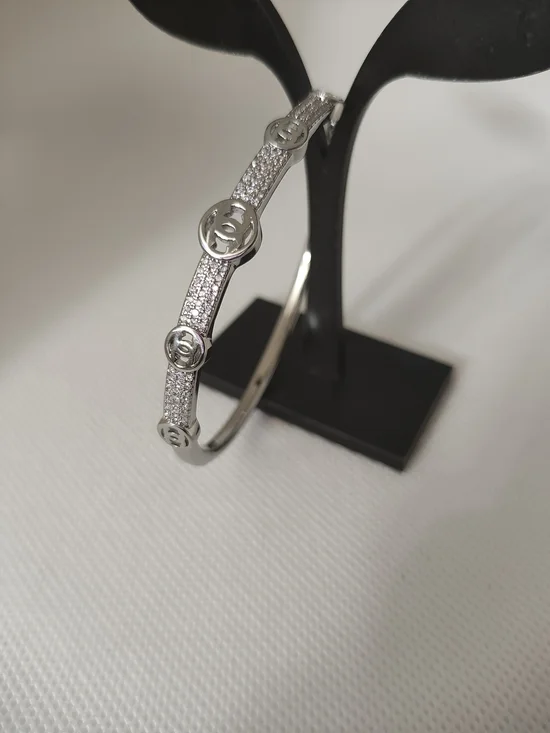 Silver Crystal Pavé Logo-Accent Bangle Bracelet - Picture 1 of 6